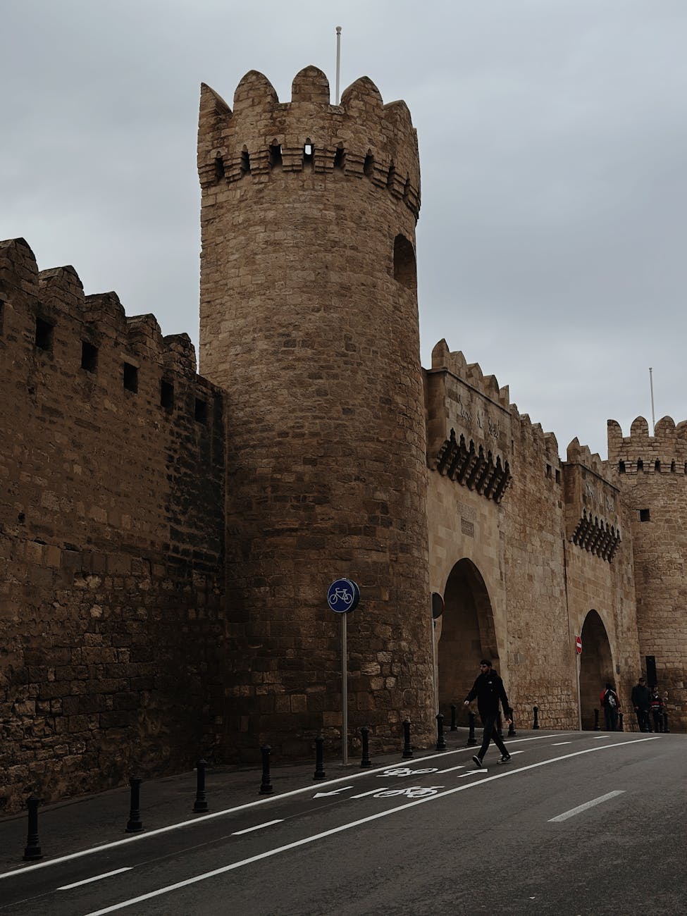 historic stone fortified wall with arched gateways
