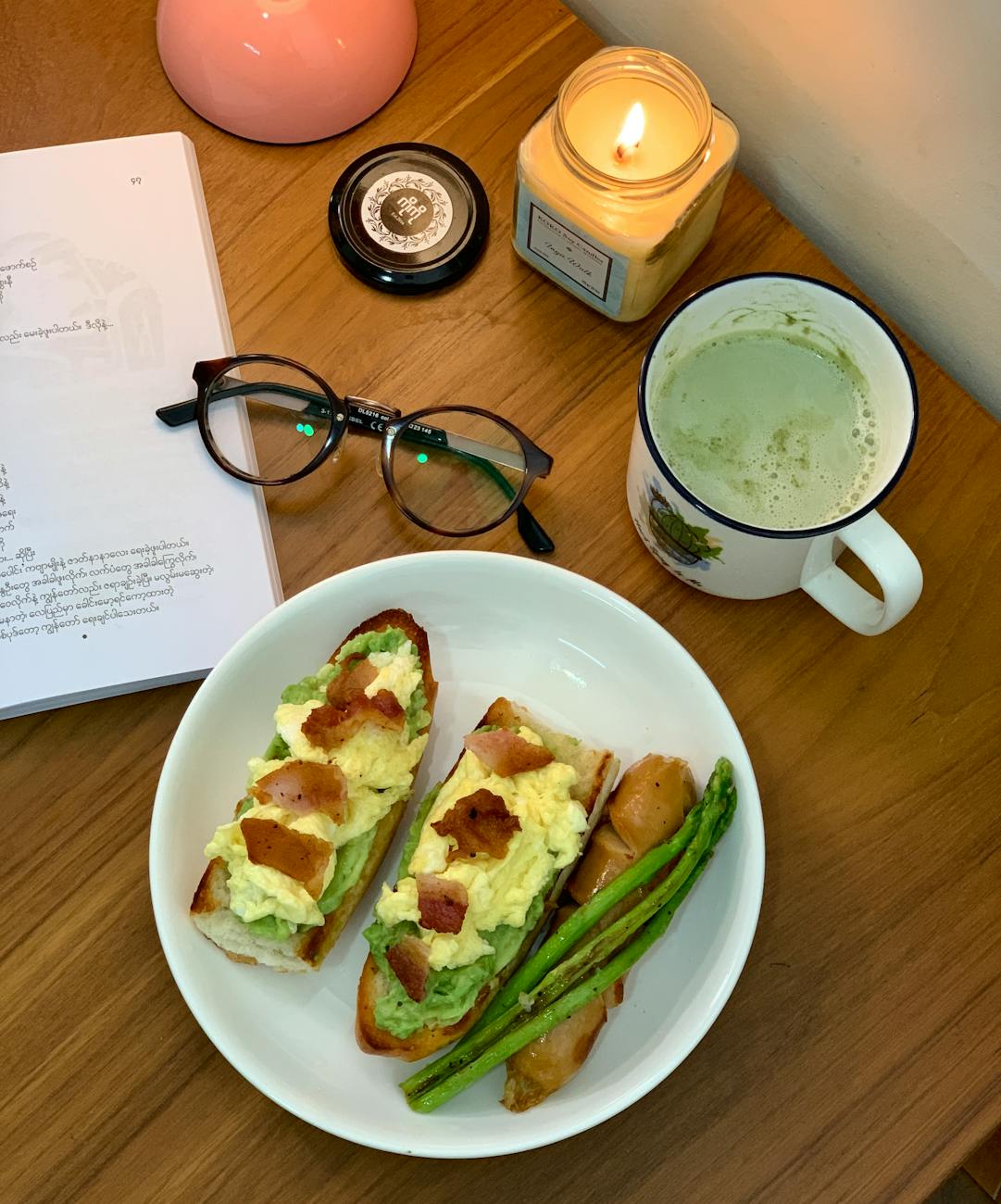 a plate with toast eggs and a cup of coffee